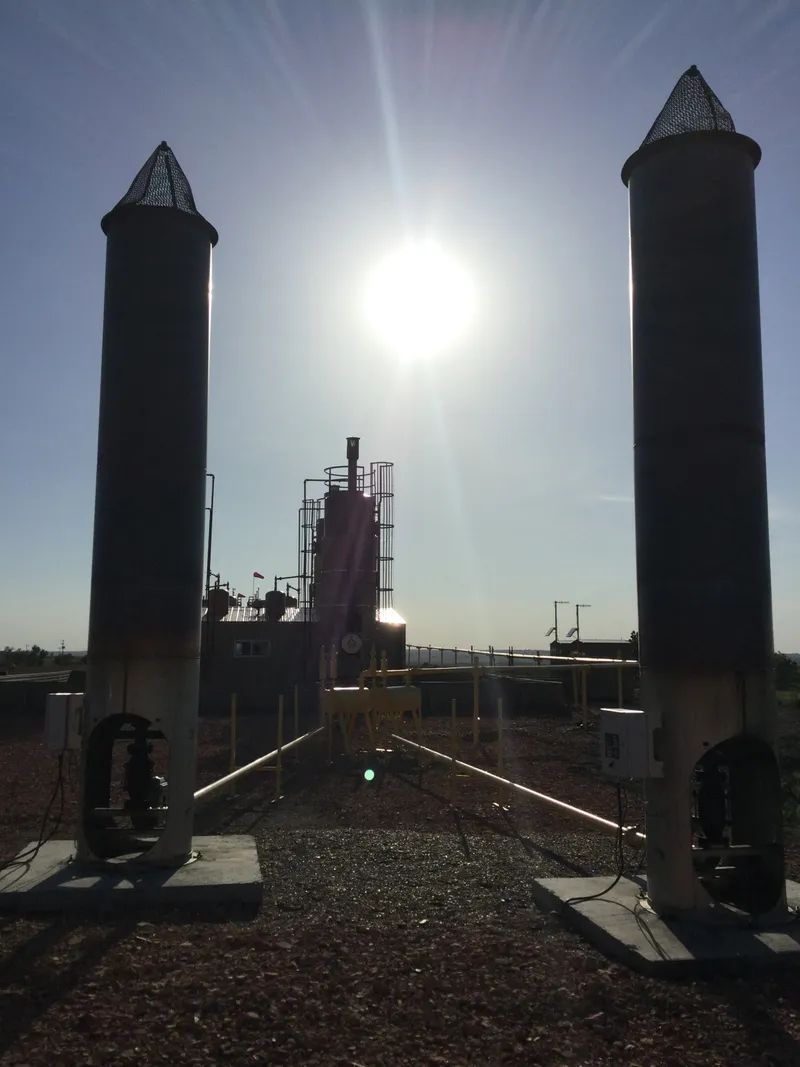 Enclosed Combustion Device - Dual-stack Quad O compliant combustor installation providing redundant emission control capacity for high-volume gas processing facilities.